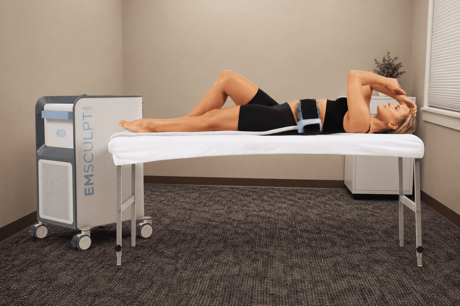The EMSCULPT NEO device in a WellForm treatment room