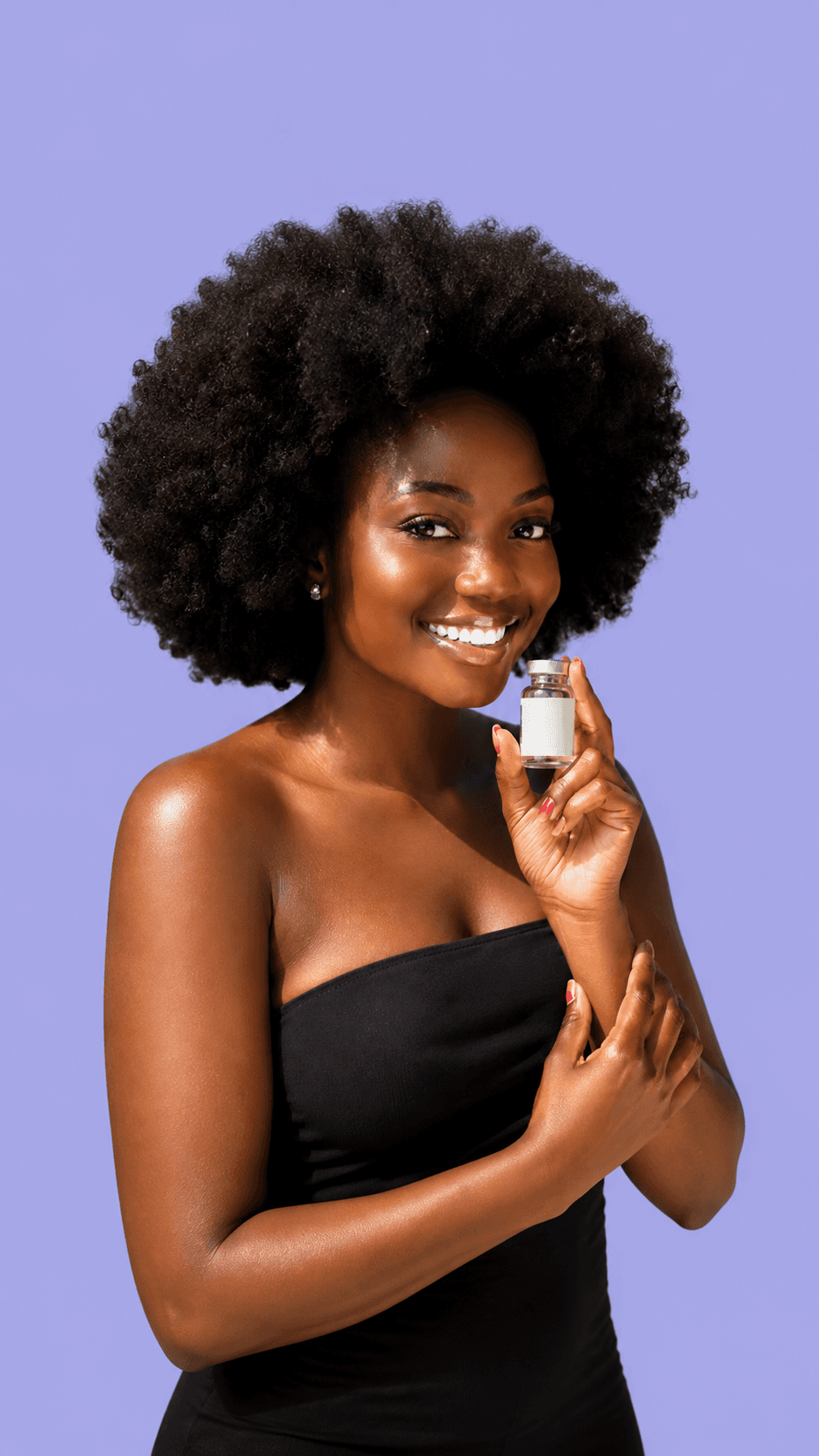 Smiling woman holding a wellness vial