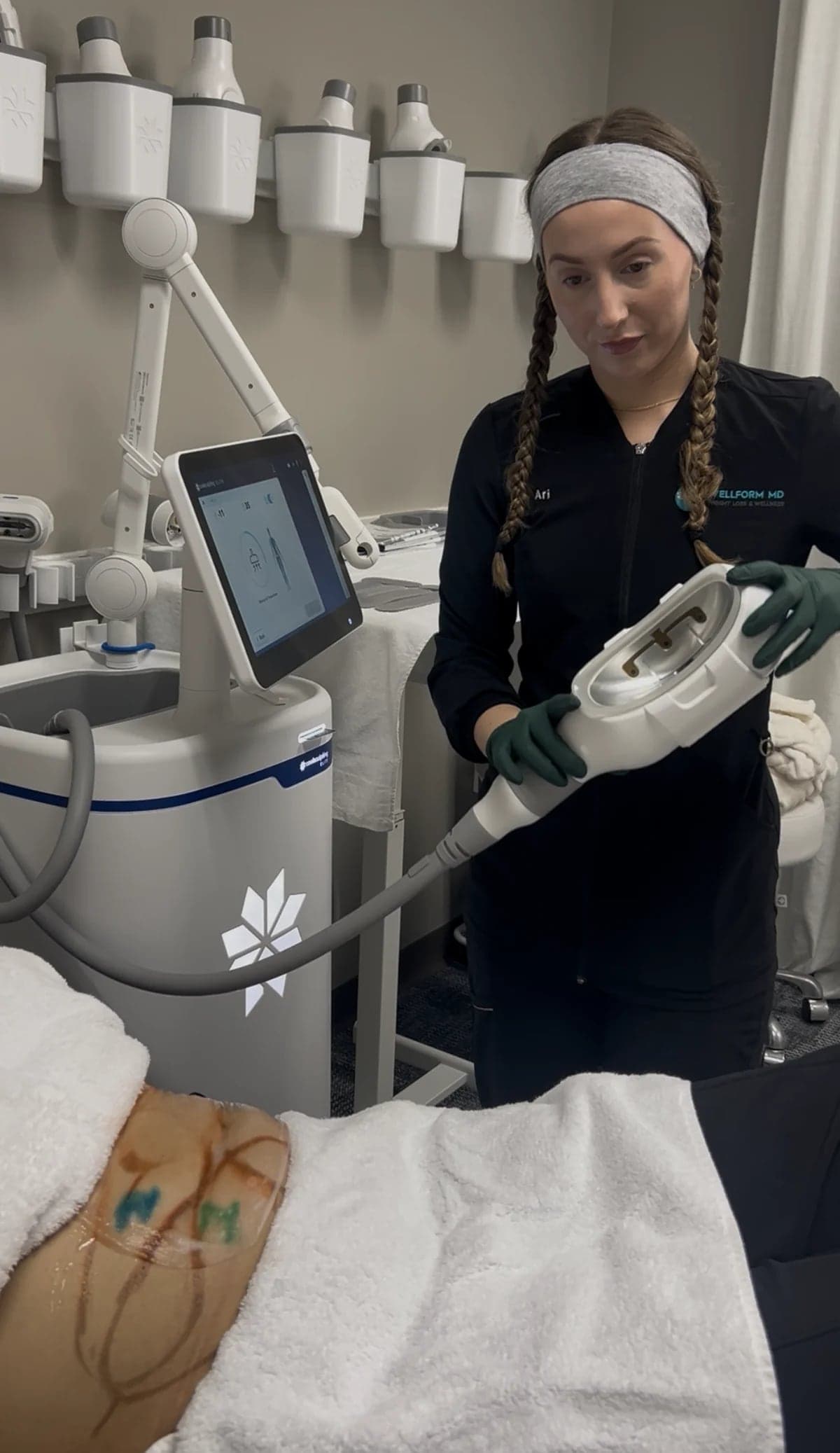WellForm MD team member preparing a CoolSculpting Elite applicator